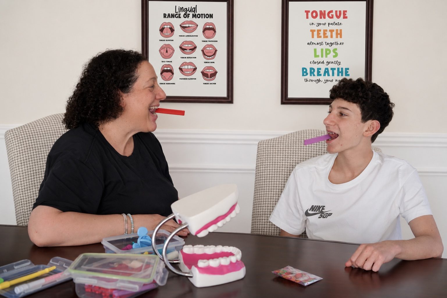 Cynthia guiding tongue and oral-motor exercises with a child